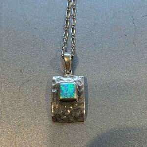 Beautiful opal at 9:25 pendant. artisan made